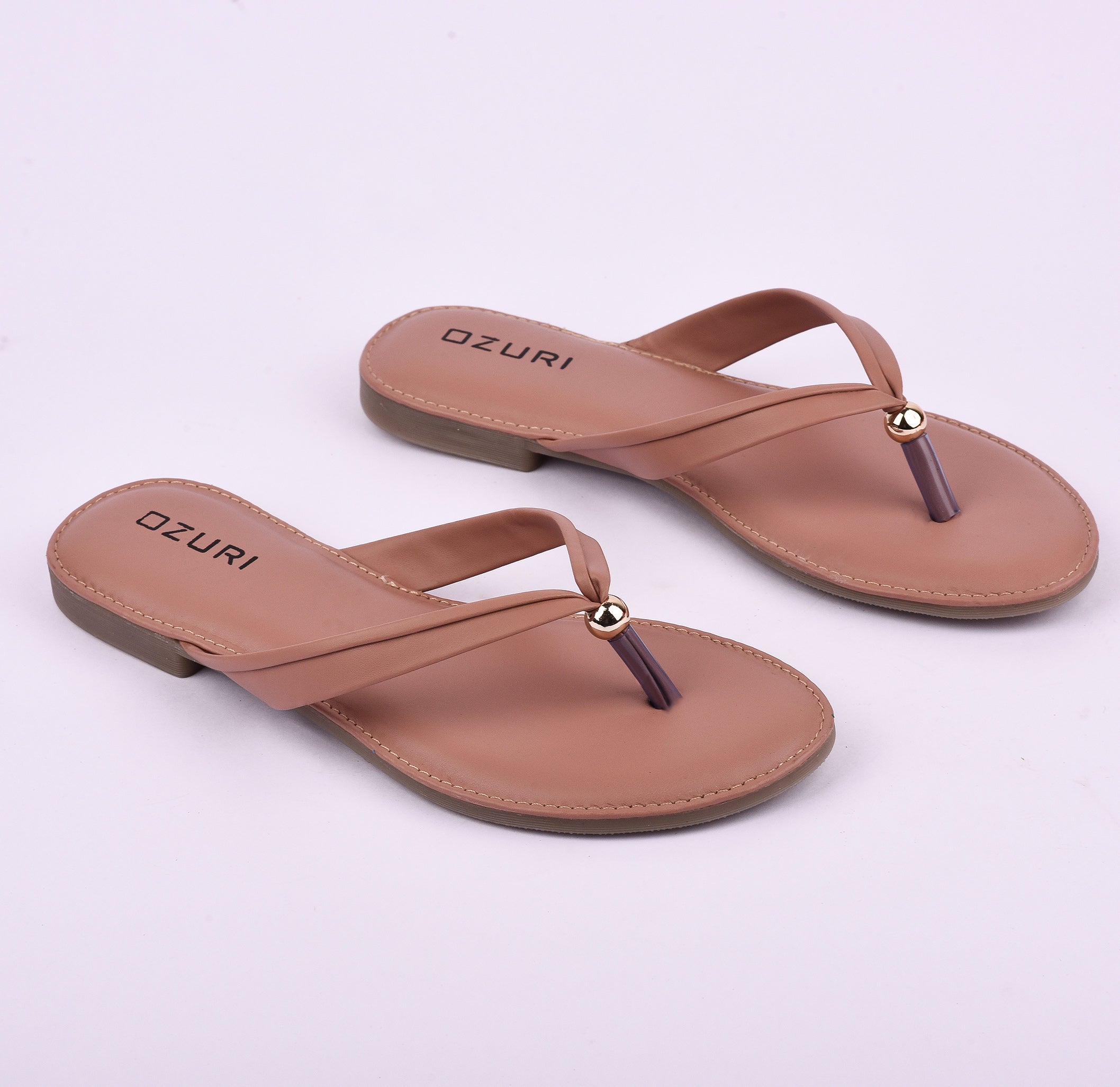 Ozuri Elegant Slip-On Flat Sandals with Minimal Charm Detailing