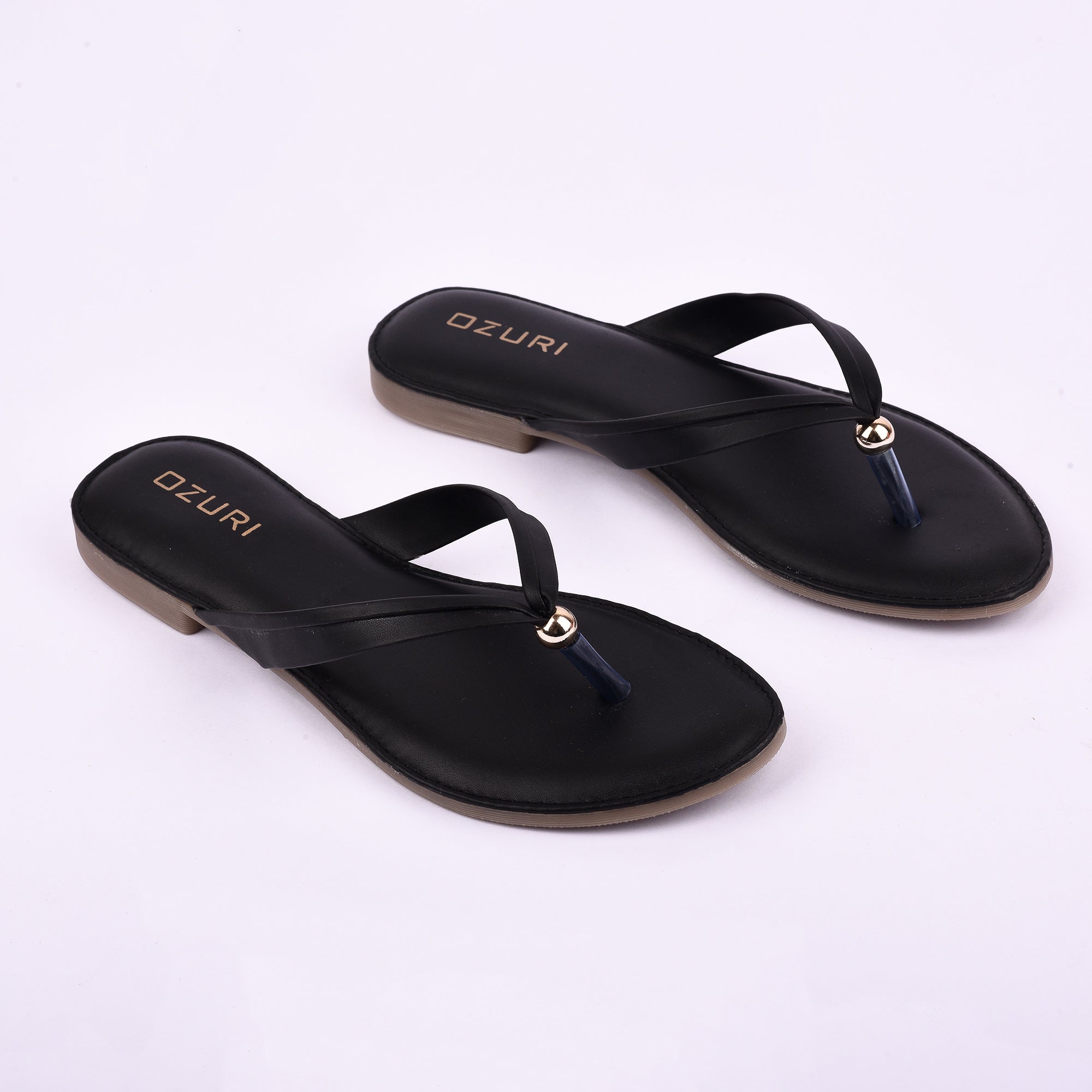 Ozuri Elegant Slip-On Flat Sandals with Minimal Charm Detailing