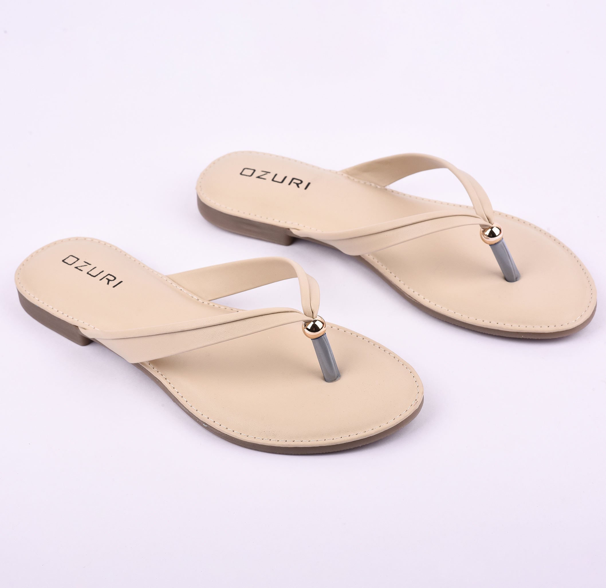 Ozuri Elegant Slip-On Flat Sandals with Minimal Charm Detailing