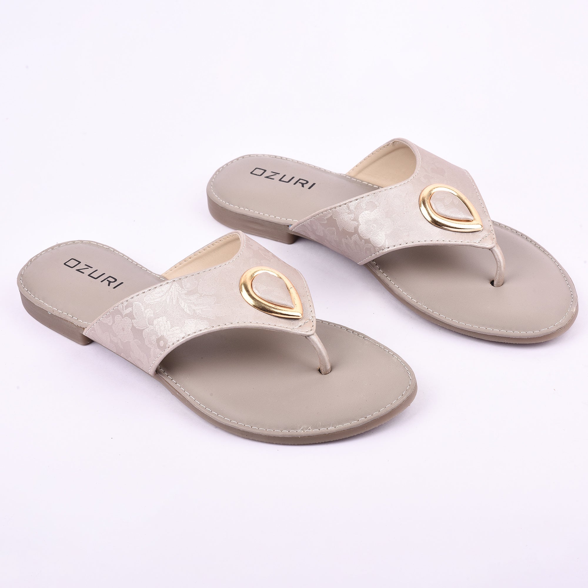 Ozuri Stylish Embossed Slip-On Flats with Metallic Teardrop Accent