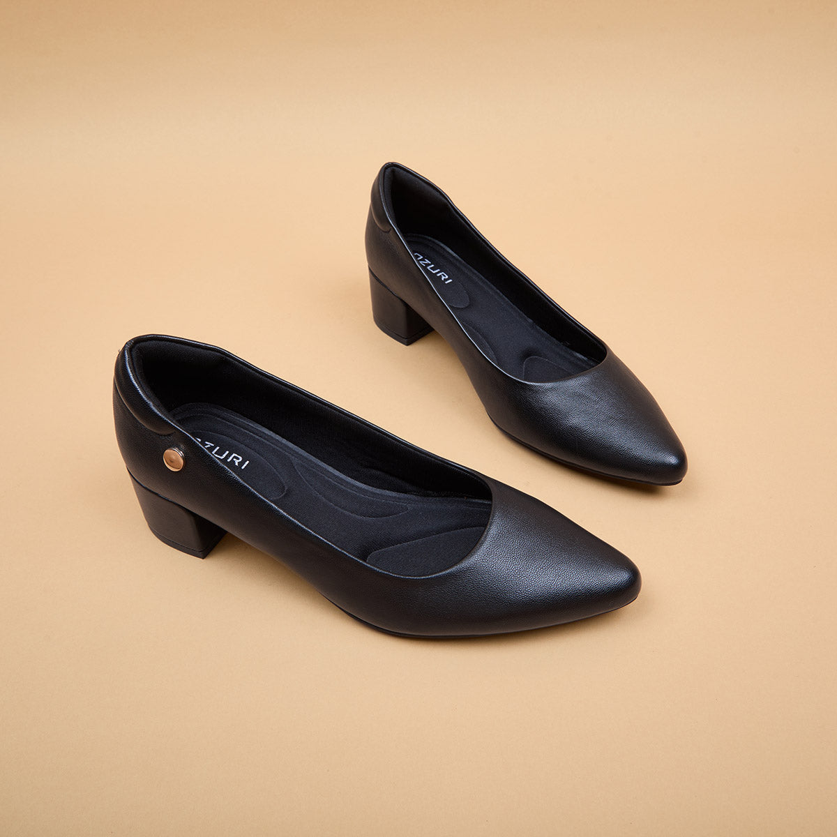 Noele Leather Pumps