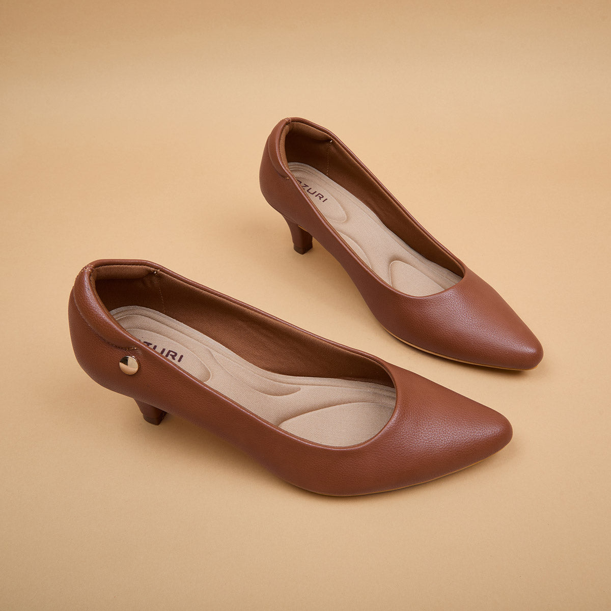 Claude Leather Pumps