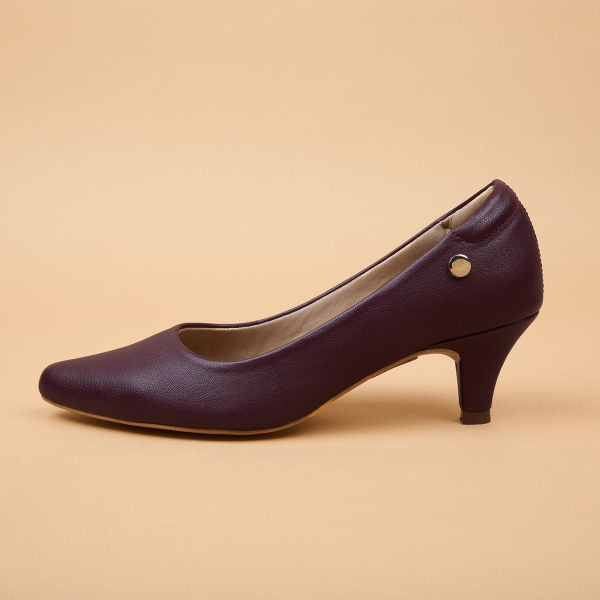 Claude Leather Pumps